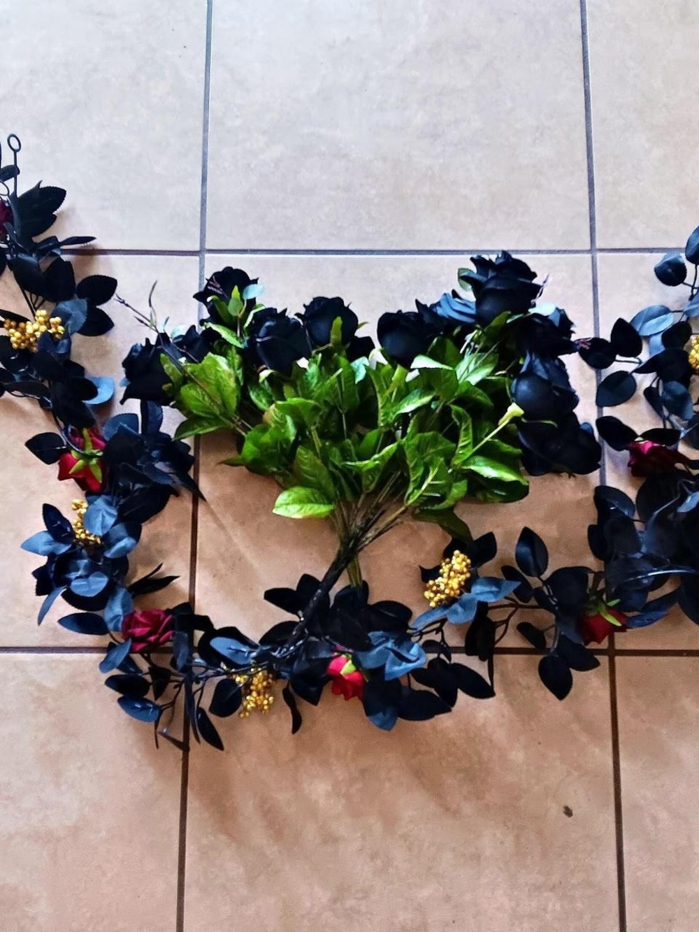 Source Unknown Black Rose and Green Leaf Garland with Yellow Berry Accents